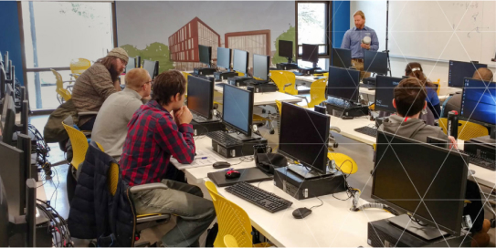 workers in an office looking busy